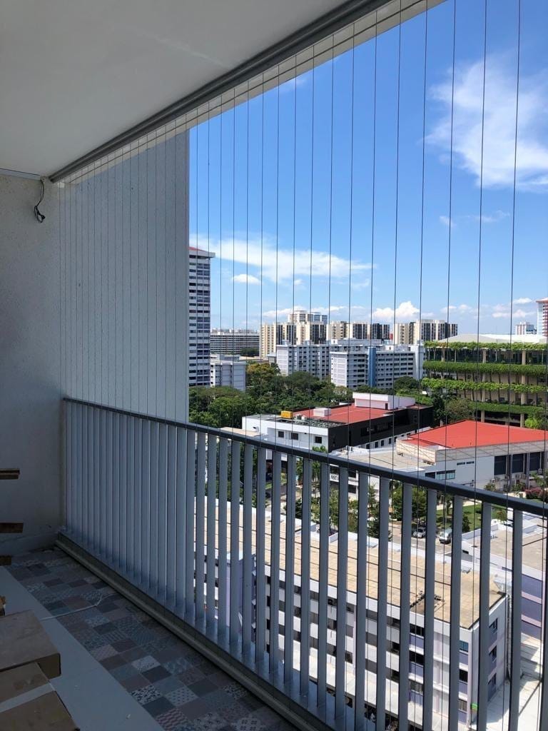 Close-up of an invisible grill preserving the balcony view